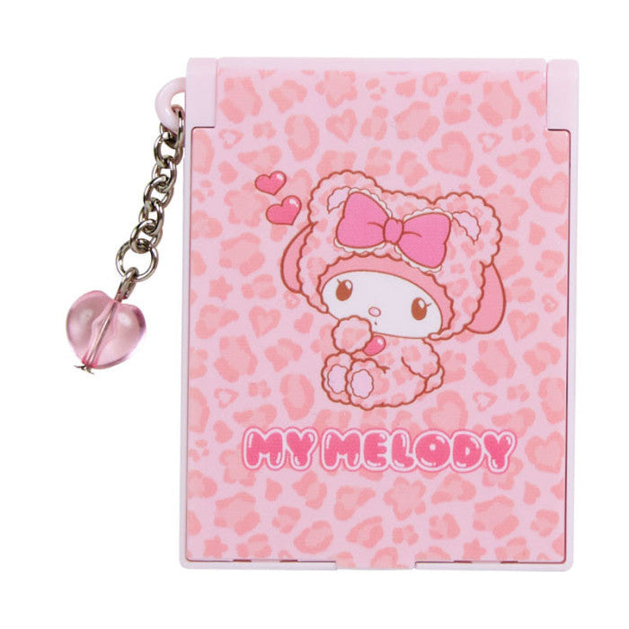Pink notebook with 'My Melody' character and heart pattern on a white background