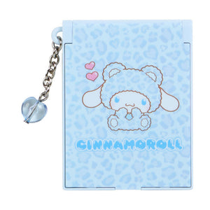 Small blue notebook with a character design and 'Ginamoroll' text, featuring a keychain attachment.
