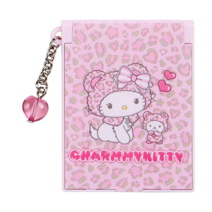 Pink notebook with leopard print and cartoon character, featuring 'Charmmy Kitty' on a white background.