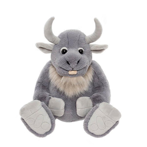 Gray plush toy with bull-like features on a white background