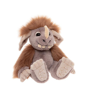 Plush toy elephant with brown ears and trunk on a white background