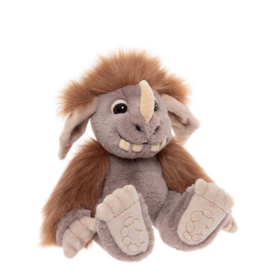 Plush toy elephant with brown ears and trunk on a white background