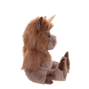 Plush toy unicorn with brown fur and a white horn on a white background