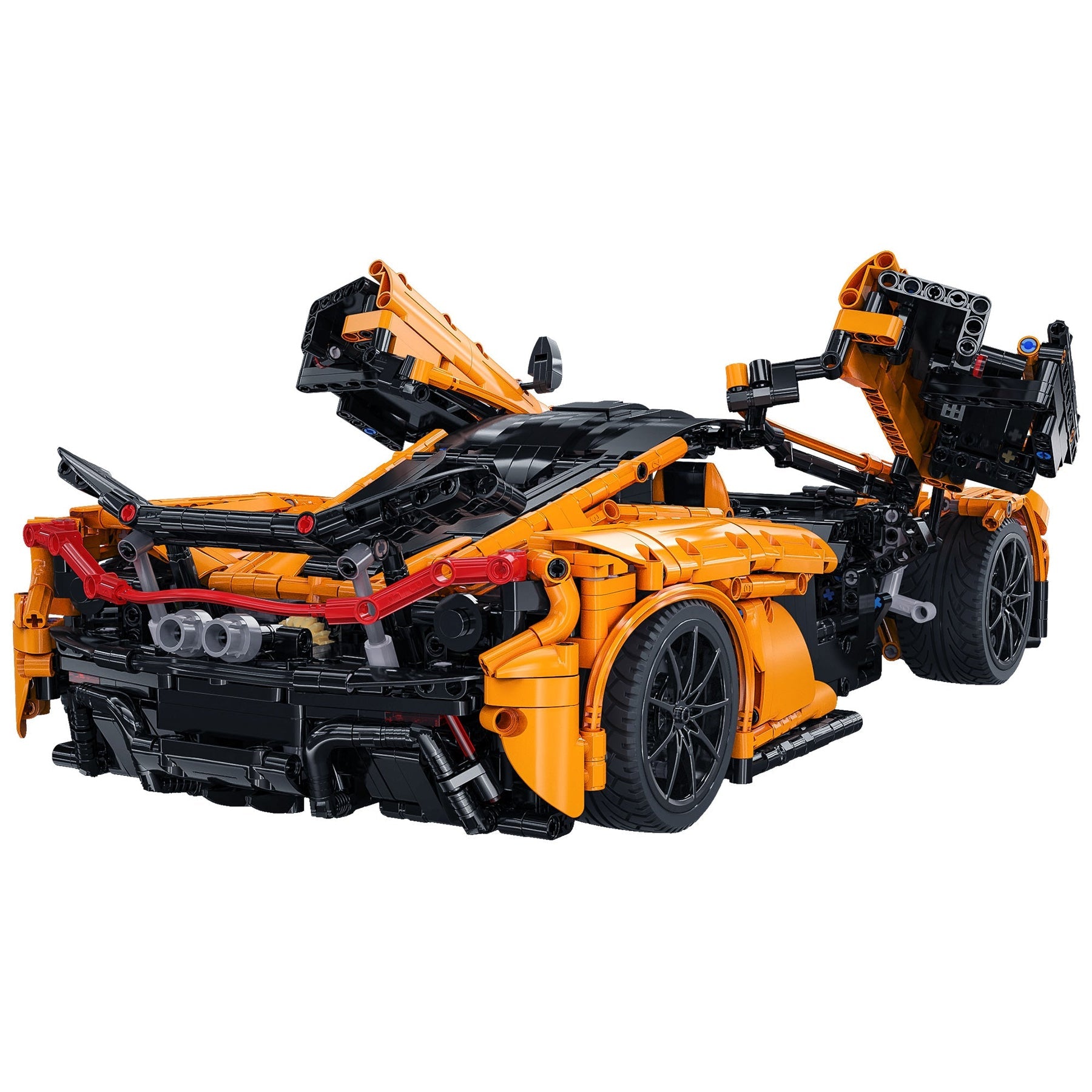 Orange and black toy car model on a white background