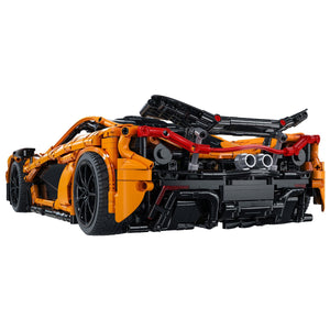 Toy car model built with interlocking bricks on a white background