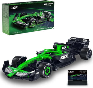 Green and black toy Formula 1 car with CaDA branding on a white background