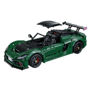 Green sports car model made of interlocking bricks on a white background