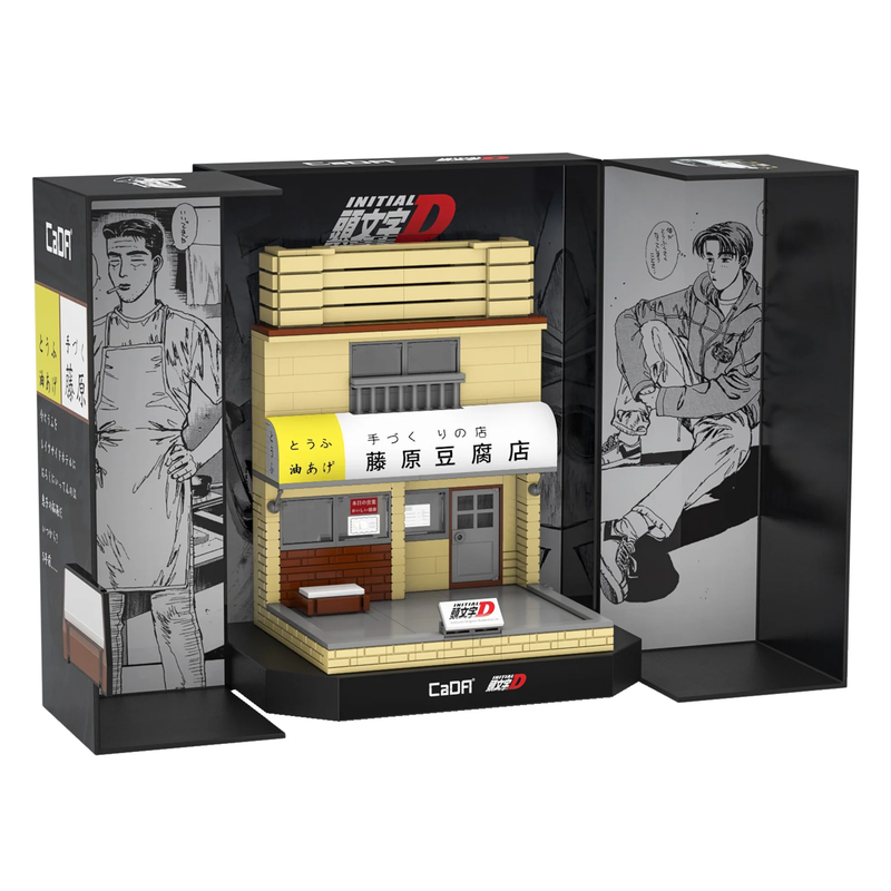 Model of a building with 'Initial D' branding on a black box with illustrations.