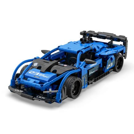 Blue toy race car made of interlocking bricks on a white background