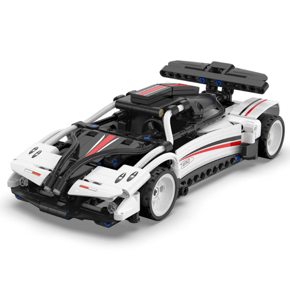 Toy car model built from interlocking bricks on a white background
