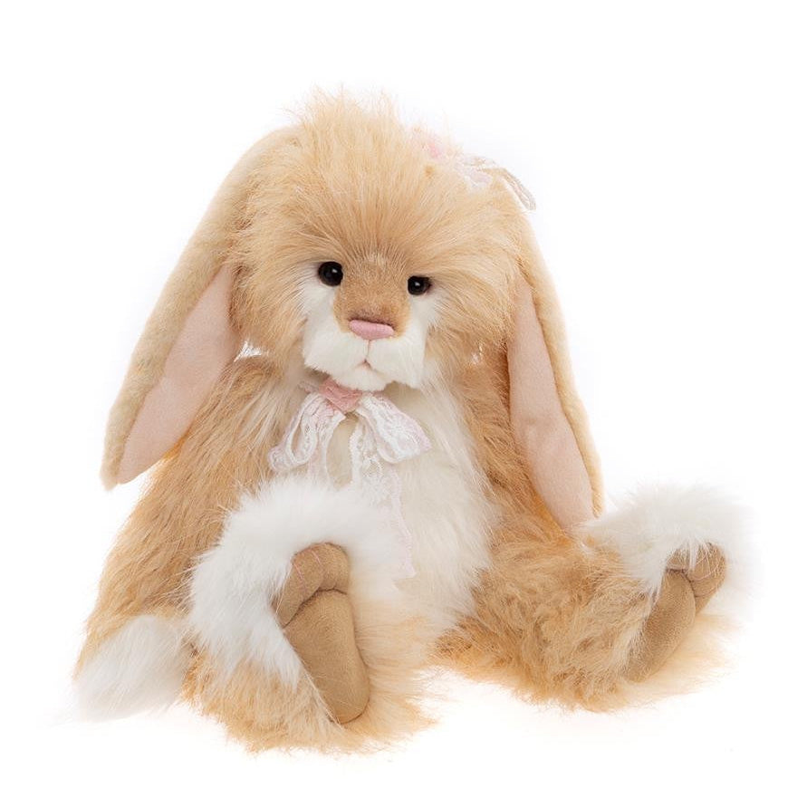 Plush toy rabbit with long ears on a white background
