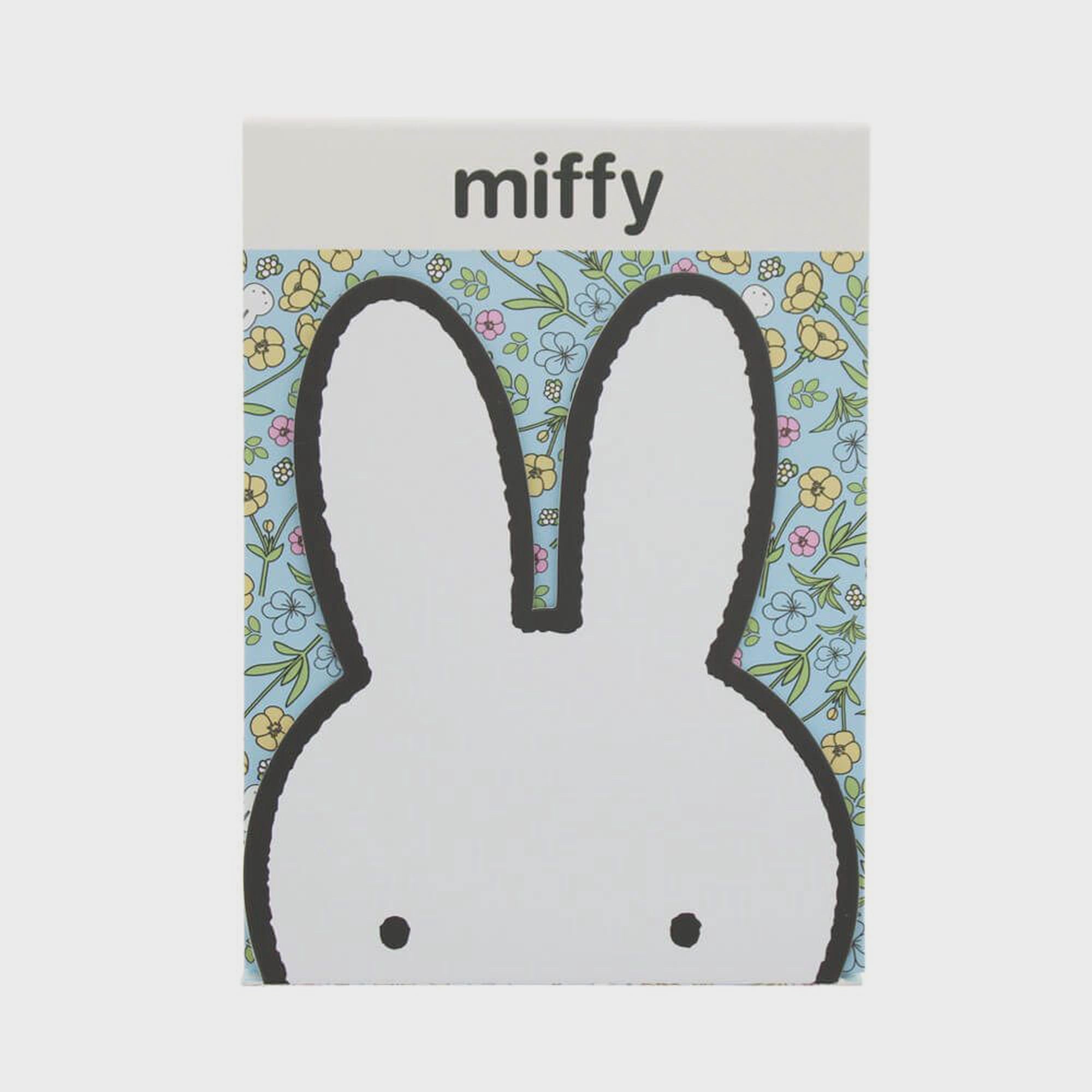 Miffy character with floral background