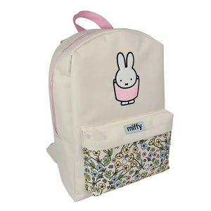 Backpack with cartoon character and floral pattern on a white background