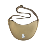Beige crossbody bag with a small embroidered design on a white background