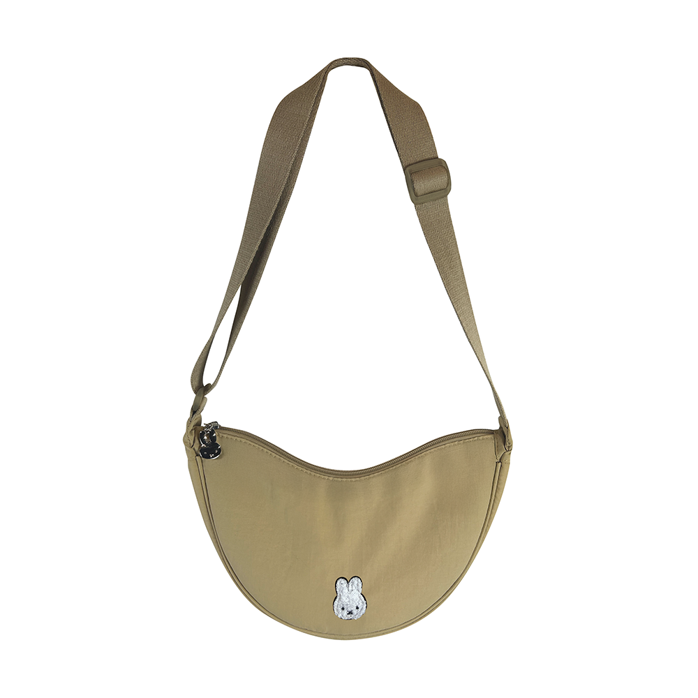 Beige shoulder bag with a small logo on a white background