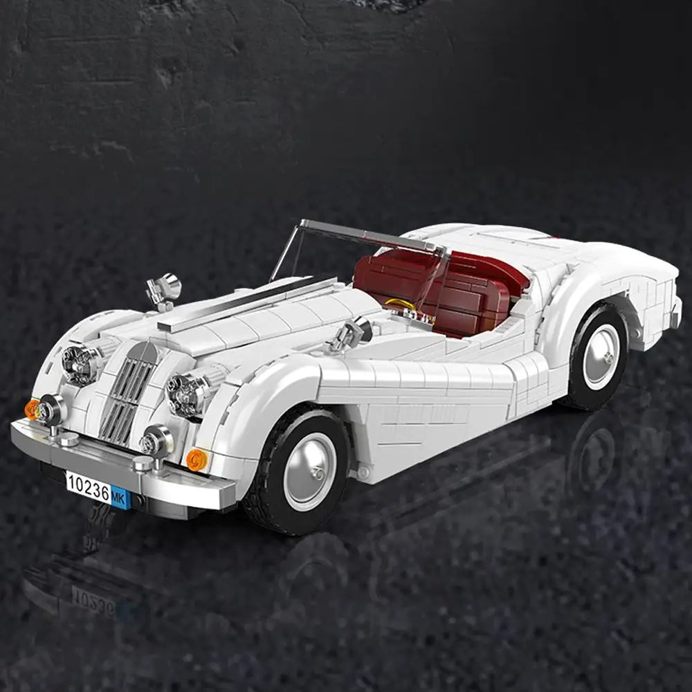 White convertible car model made of interlocking bricks on a dark textured background