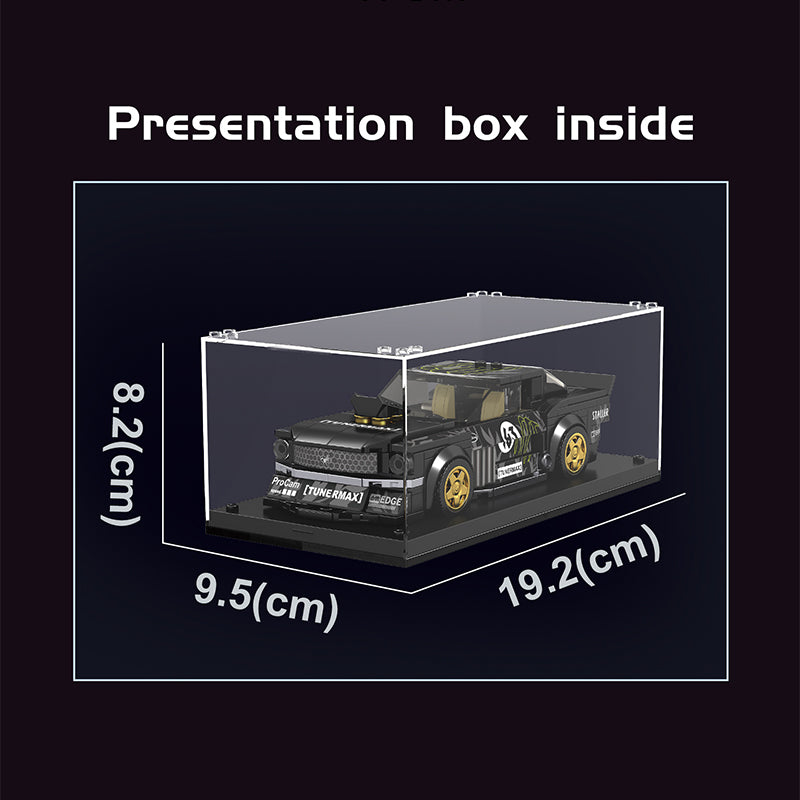Model car inside a clear display box with dimensions on a black background