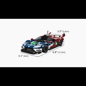 Model car made of interlocking bricks with dimensions indicated on a white background