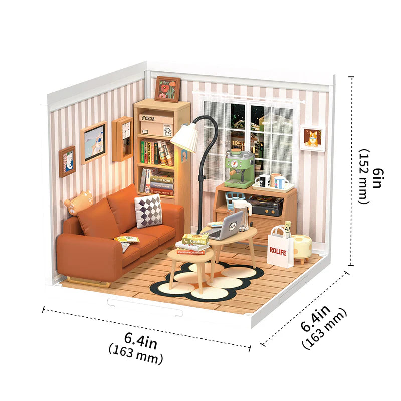 Miniature model of a living room with furniture and decor, including dimensions.