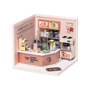Model of a bubble tea shop with various appliances and decor on a white background