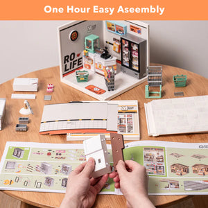 Model building kit with assembly instructions on a table, featuring 'One Hour Easy Assembly' text.