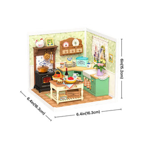 Miniature model of a kitchen with detailed furniture and decor, including dimensions displayed.
