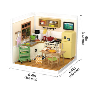Model kitchen set with furniture and appliances, including a refrigerator, stove, and sink, with dimensions indicated.