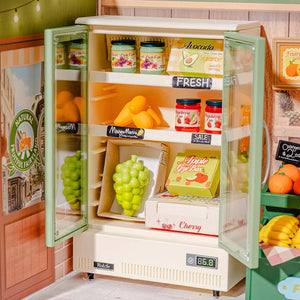 Miniature refrigerator with food items inside, styled like a toy or model.