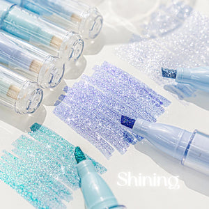 Cosmetic applicators with glittery tips on a white background, labeled 'Shining'.