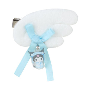 White hair clip with a blue ribbon and small character charm on a white background