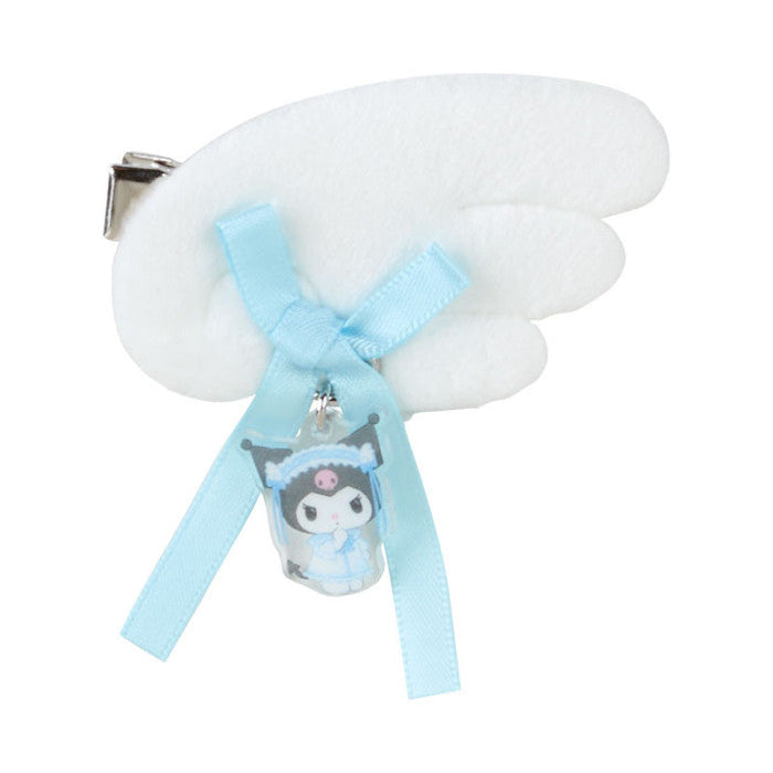 White hair clip with a blue ribbon and small character charm on a white background