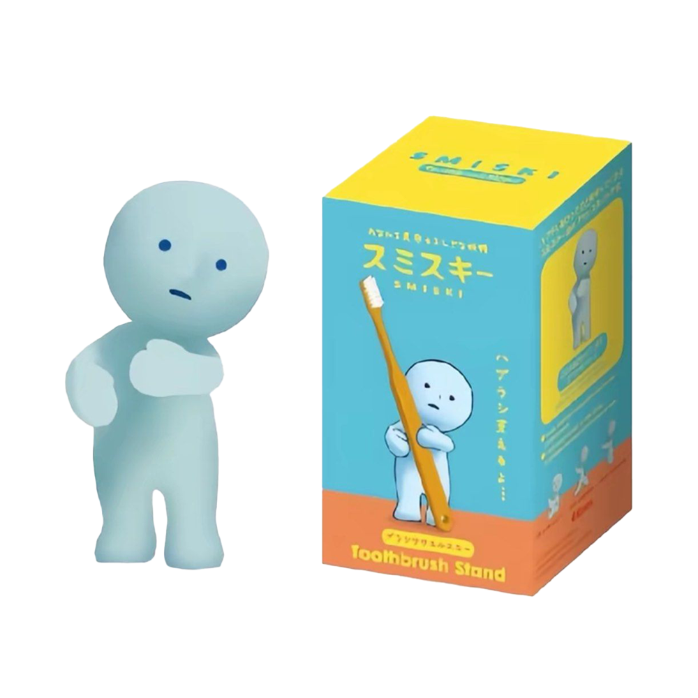 Blue cartoon character figure with a toothbrush and packaging on a white background