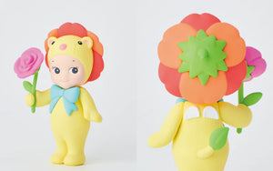 Two colorful toy figures, one holding a pink flower and the other with a flower head, on a white background.