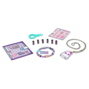 Collection of jewelry-making items including beads, a necklace, and packaging on a white background