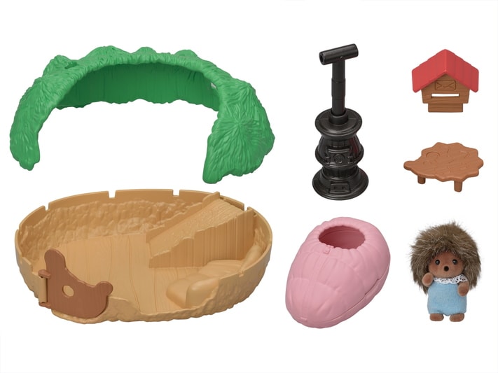 Set of toy accessories including a green arch, brown bowl, pink ball, black pump, and small figures on a white background.