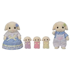 Set of toy sheep figures with a mother sheep and three lambs on a white background