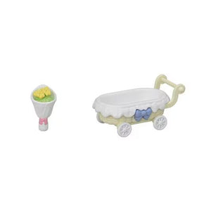 Small toy stroller with a baby bouncer attached on a white background
