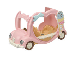 Pink toy car with sand and an ice cream cone on a white background
