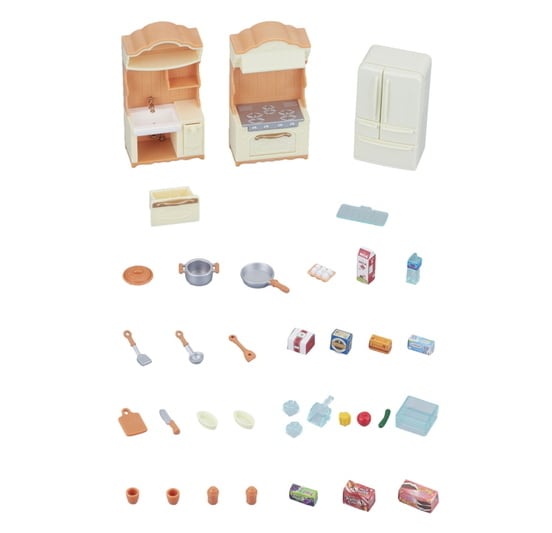 Set of miniature kitchen furniture and accessories on a white background
