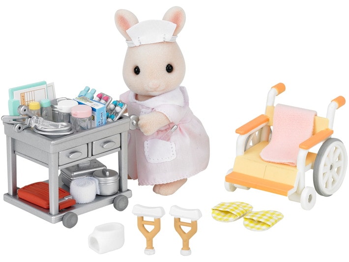 Toy set with a nurse figure, medical cart, and wheelchair on a white background