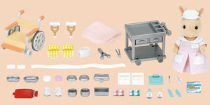Collection of toy kitchen items including a stove, refrigerator, and various utensils on a beige background