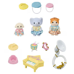 Set of toy figurines and accessories on a white background