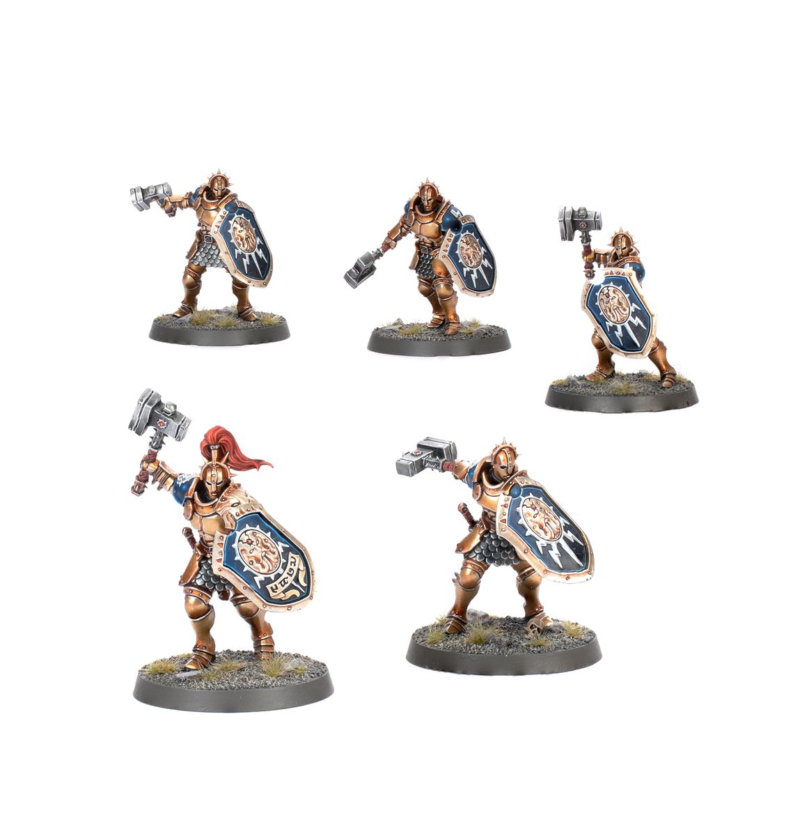 Warhammer Age of Sigmar Introductory Set miniature warriors with hammers and shields in dynamic poses.