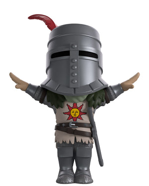 Toy figure with armor and a helmet on a white background